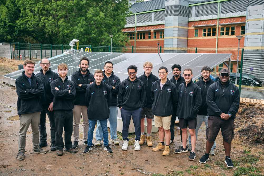 A group of people standing outside a building